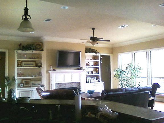 Fireplace with built-ins, TV mount (swivel/tilt)