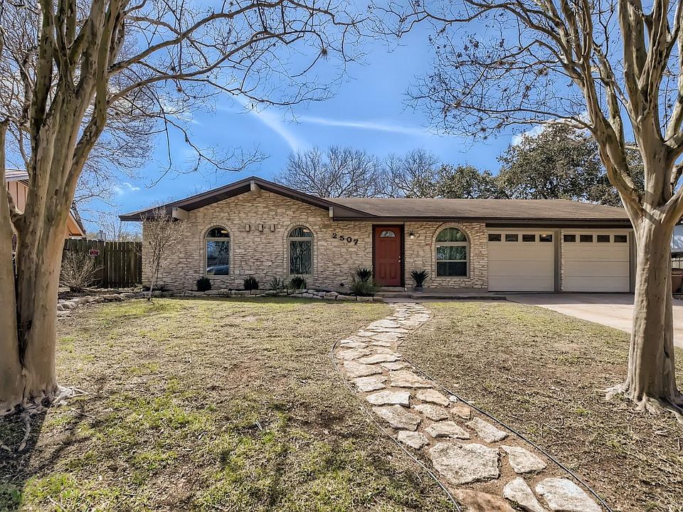 Beautiful, updated, well kept 1 story home sits on a tree shaded lot