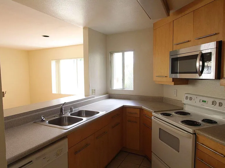 7545 Charmant Dr — Photo 4