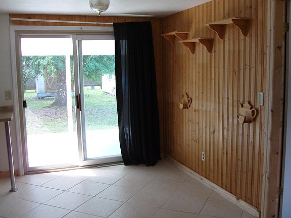 patio door off dining area to a screened in lanai