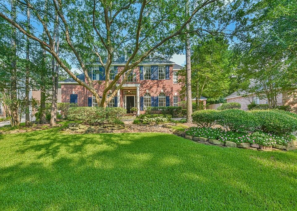 Welcome to 7 Stormwood Place; A Beautiful Custom Home in the subdivision of Mystic Lake subdivision