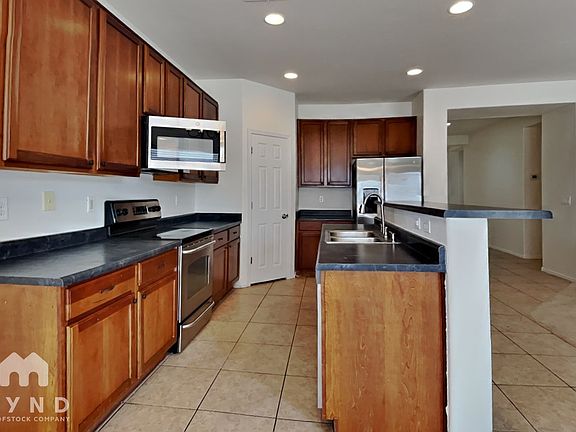 4th image of 9928 W Marguerite Ave