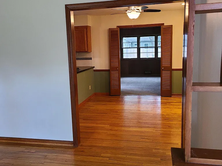 Living room looking into dining room.