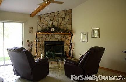 Stone Fireplace/ Den
						:
						Great for relaxing, or staying warm in the winter. Overlooking canal. Tile Floor