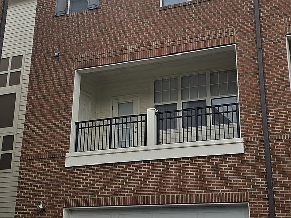 Rear porch & 2 car garage