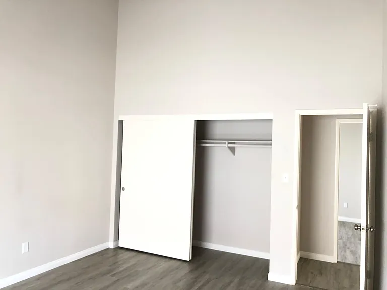 Huge second bedroom ( 16'x12') with closet and Vaulted ceiling.