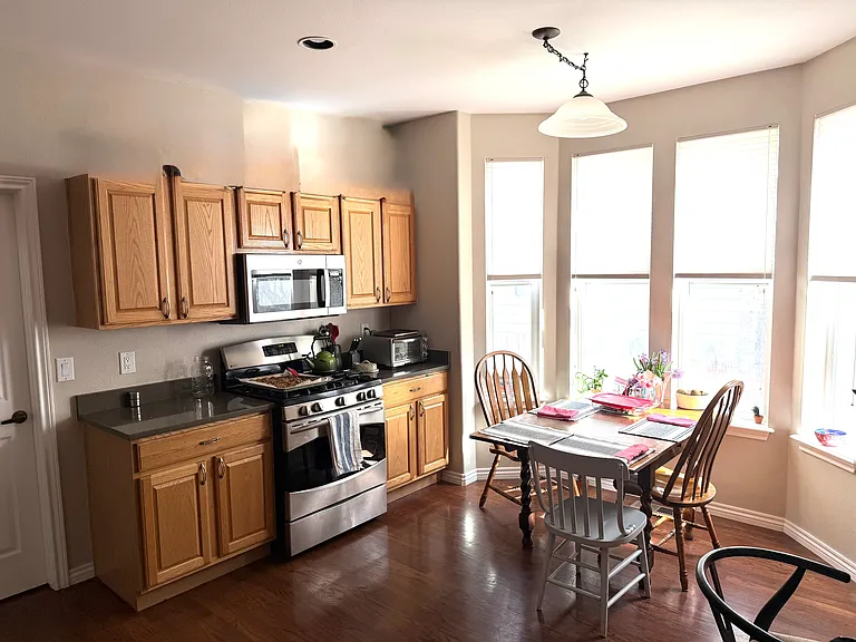 Kitchen with stainless steel appliances and walk in pantry