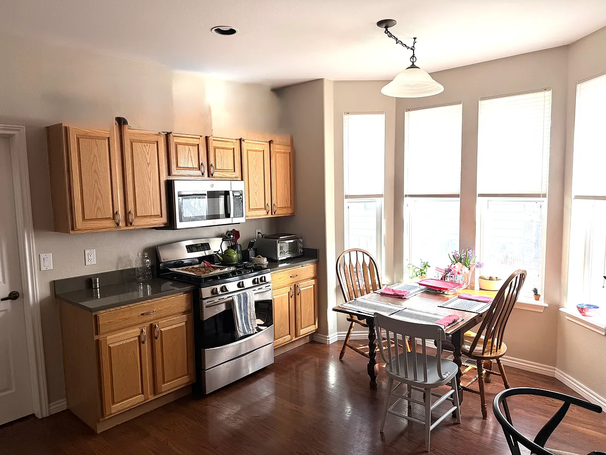 Kitchen with stainless steel appliances and walk in pantry - 228 Holland Thompson Dr