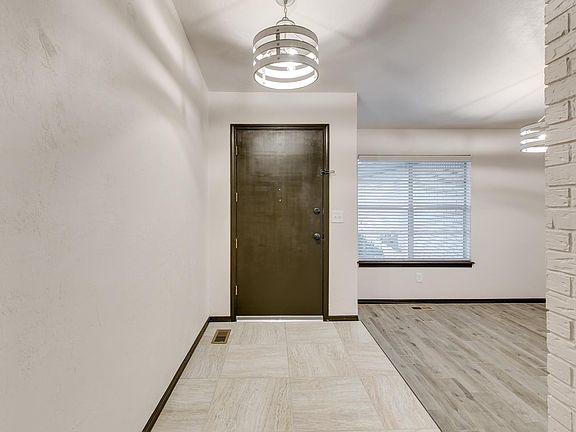 Entry way and dining. Dining could be used as a home office.