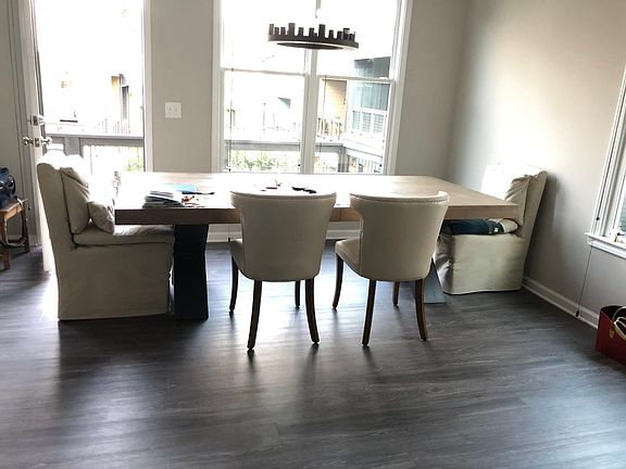 Dinning area, with a half bath off to the left side, along with an alcove for an in-home office