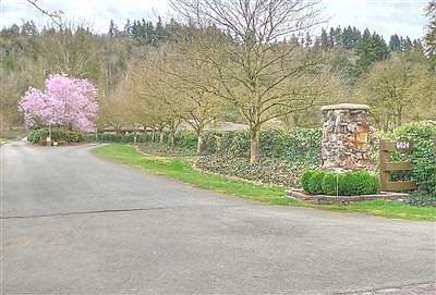 Tree lined approach is both elegant and private.