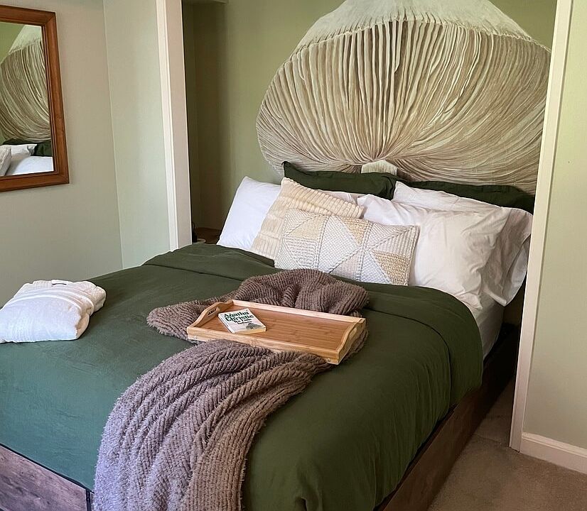 2nd bedroom with queen bed, hand painted art