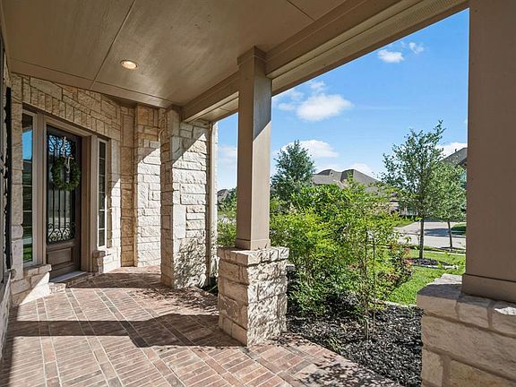 Relax and enjoy a fresh cup of coffee or a glass of wine under your spacious covered front porch!