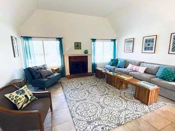 spacious family room with 16-foot ceilings.