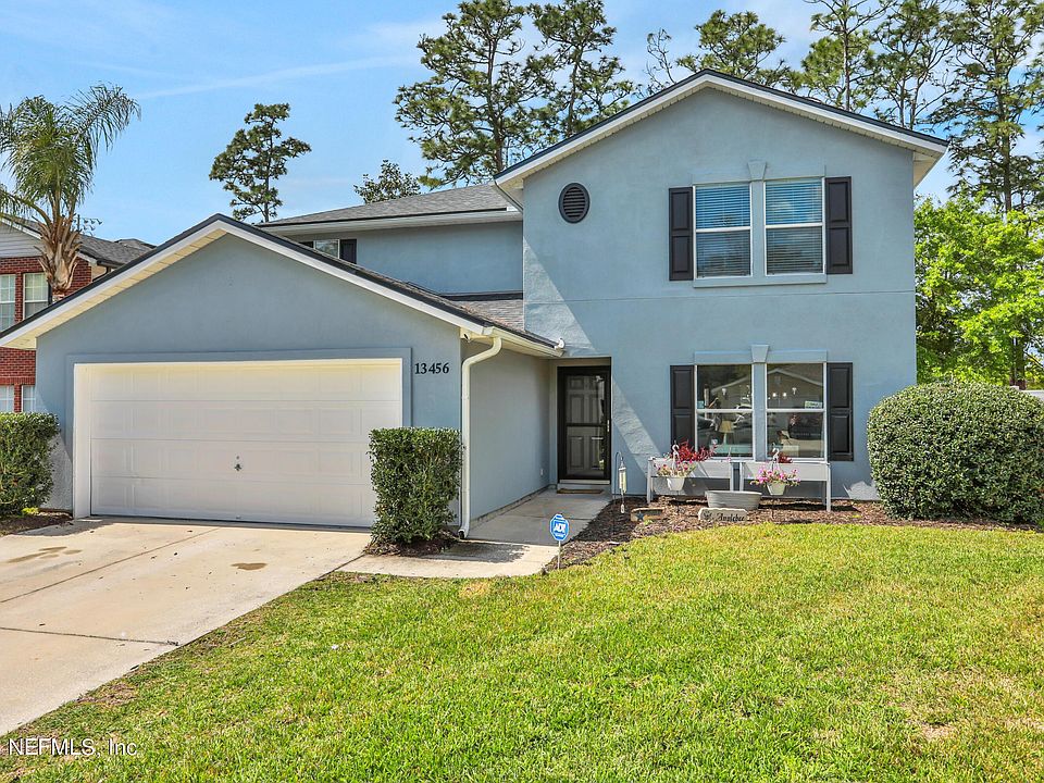 1st image of 13456 ASHFORD WOOD Court W