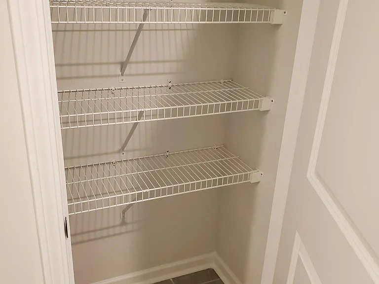 Linen closet in downstairs bathroom