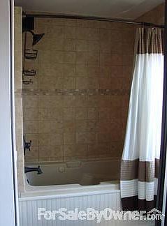 Master Bathroom
						:
						Is seperated from the master bedroom with a frosted doorway.