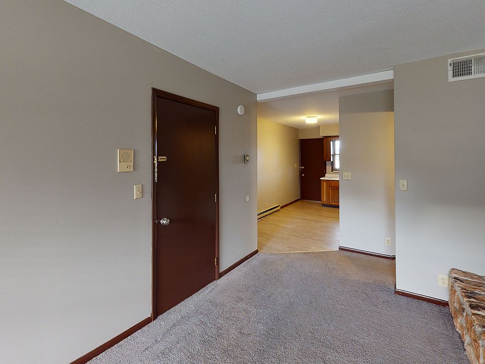 All flooring new laminate - no longer a carpeted space/unit.