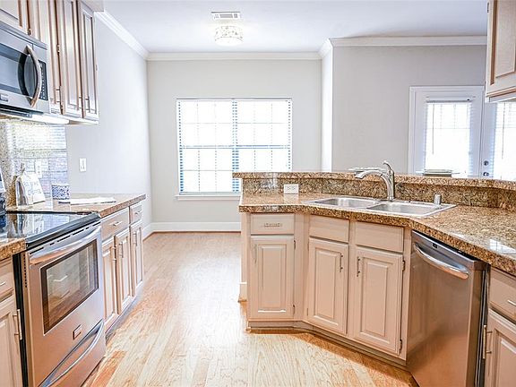 5th image of 5950 Lindenshire Ln #402-L
