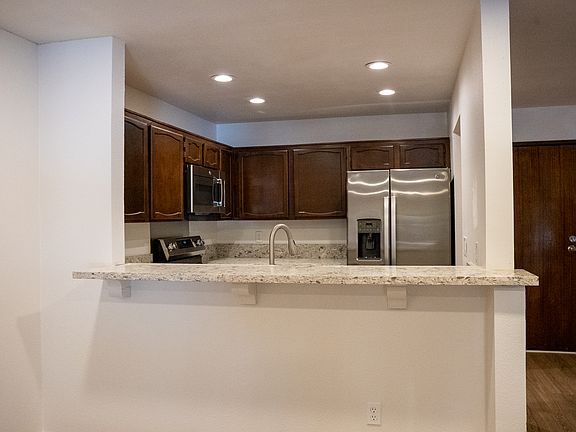 Kitchen open window bar at living room