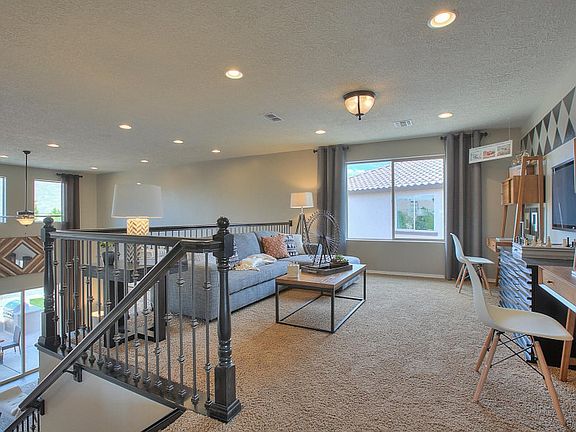 Upstairs you ll find a loft that creates a comfortable space to cozy up and watch movies or play boa