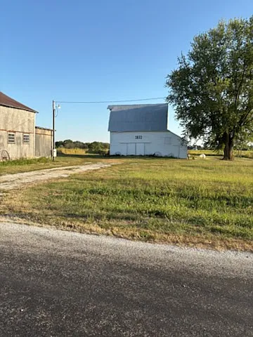 The 1832 Lodge at Stagecoach Stop at Anchor Farm plus the 1825 event barn (the oldest structure in Schuyler County) on the left.