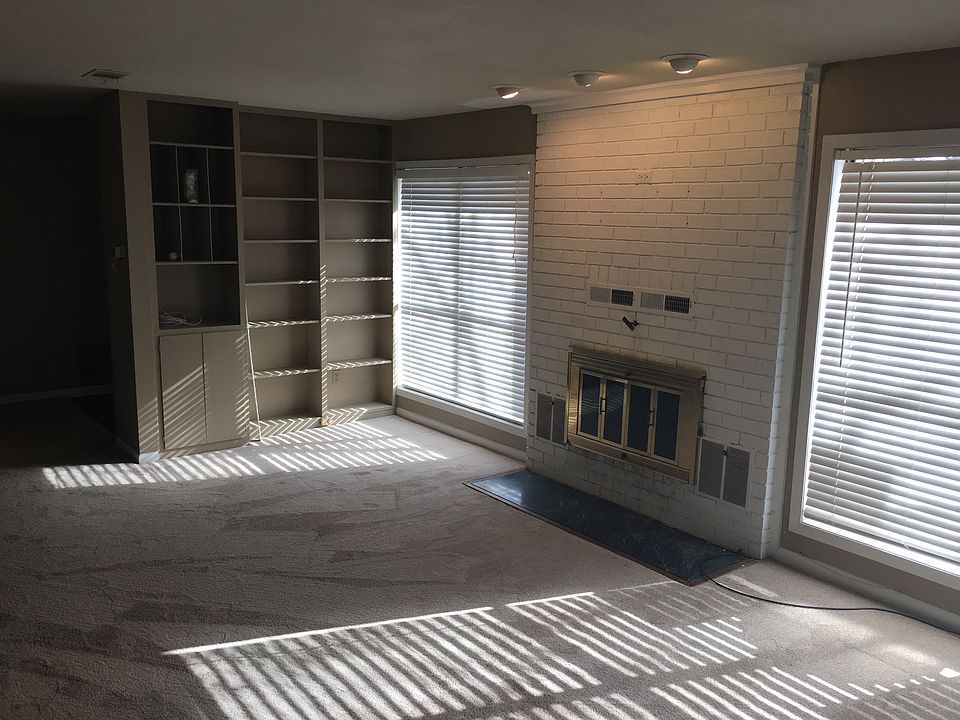 Living room with built in bookshelves
