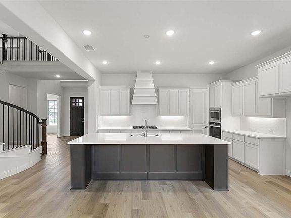 Brennan II floor plan by Pacesetter Homes featuring both the first and second floors with open-conce