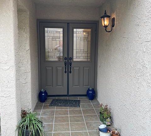 The enter through these double doors.