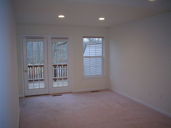 Living room w /french doors to deck