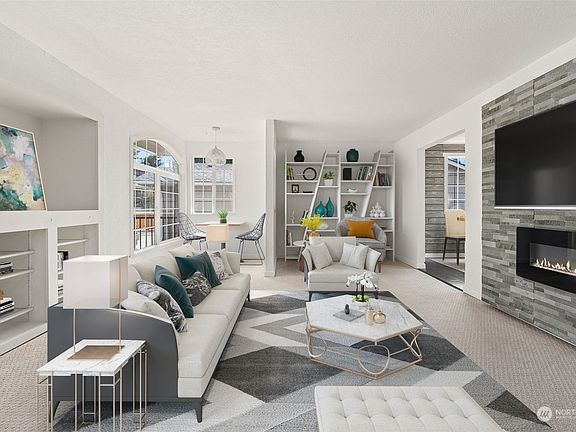 Main level living room (virtually staged)>