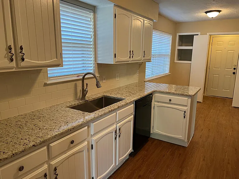 Updated Kitchen, fresh paint, new sink & faucet, granite counter tops