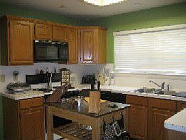 Spacious kitchen with tile floors