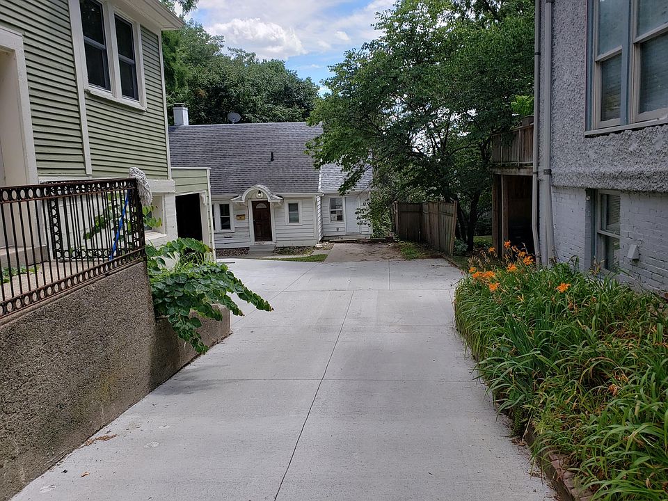Shared driveway with neighbor and back house.