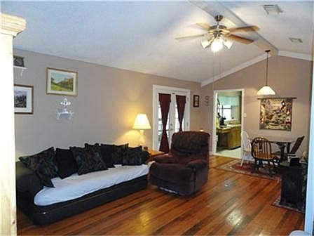 Another view of living room,  French doors lead to large covered patio