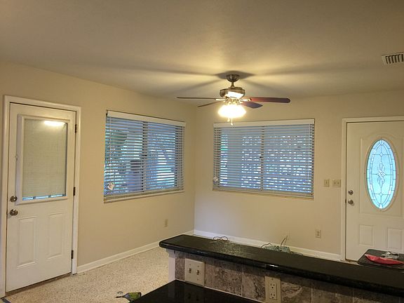 Kitchen looking into living room