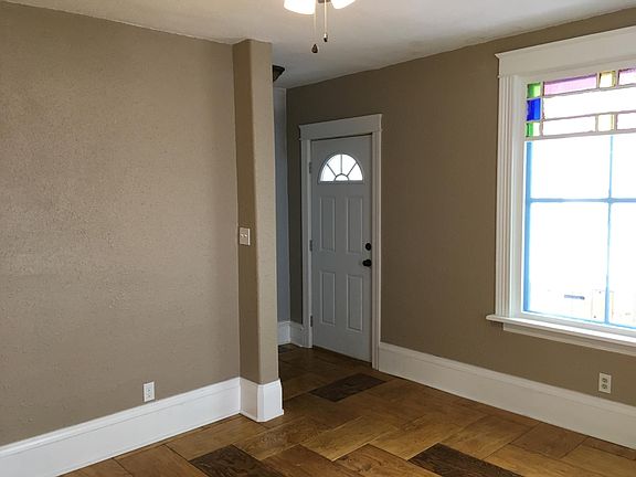 Front door - leads into Living Room and up the stairs.