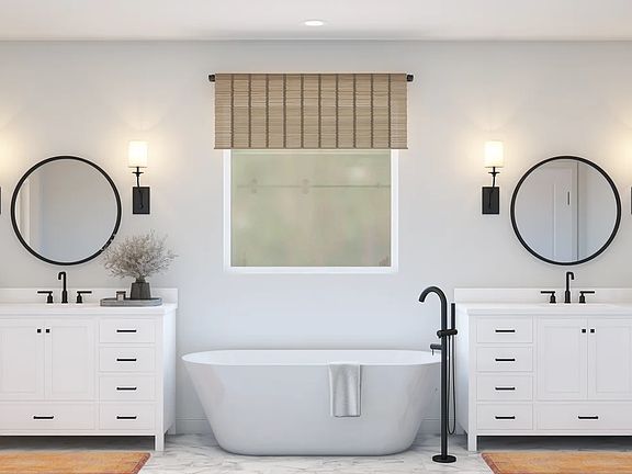 Primary bath with dual vanities and matte black fixtures