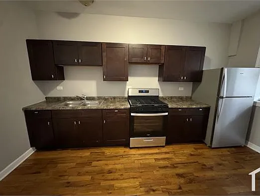 110 N Menard Ave — Photo 1