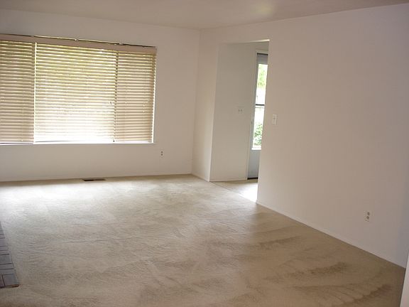 spacious living room with big picture window