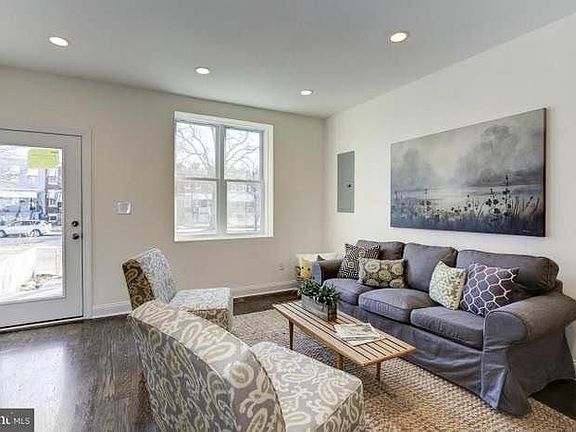 Living room area and front entrance.
