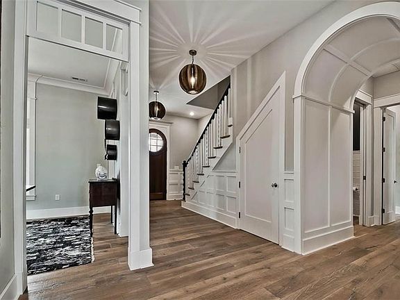 Impressive Barreled Entry is the Perfect Prelude to this Gorgeous Home's Master Wing...