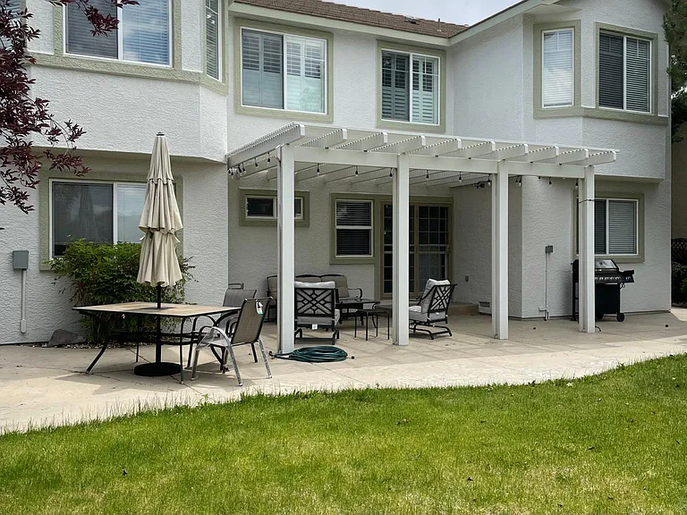 Back yard. the room for rent is on the far right in the photo.