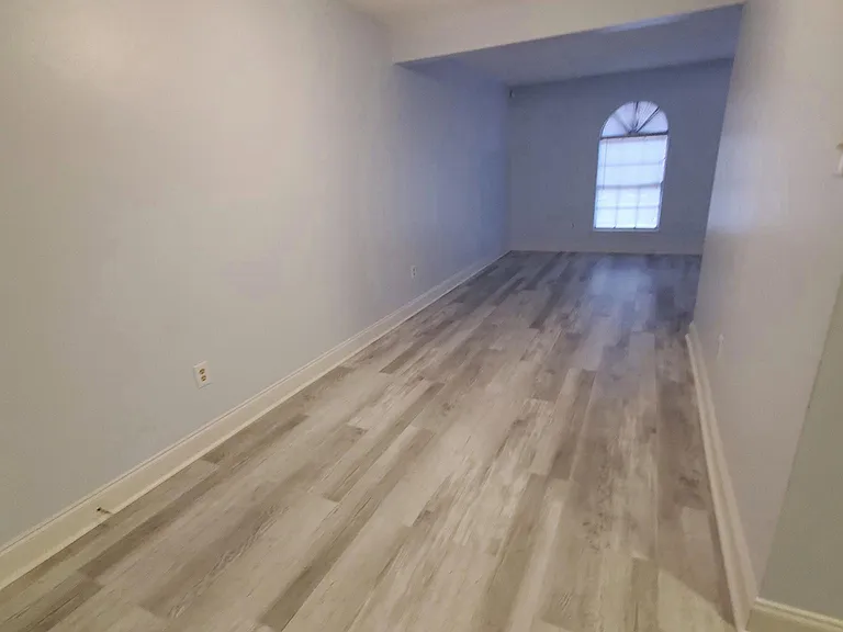 VIEW FROM BACKDOOR TO LIVING AREA
NEW FLOORING AND PAINT