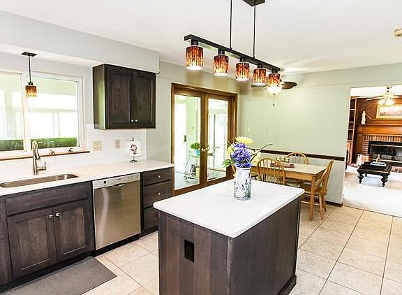 Kitchen was recently updated in January 2017. Espresso cabinets, quartz counter tops, subway tile ba