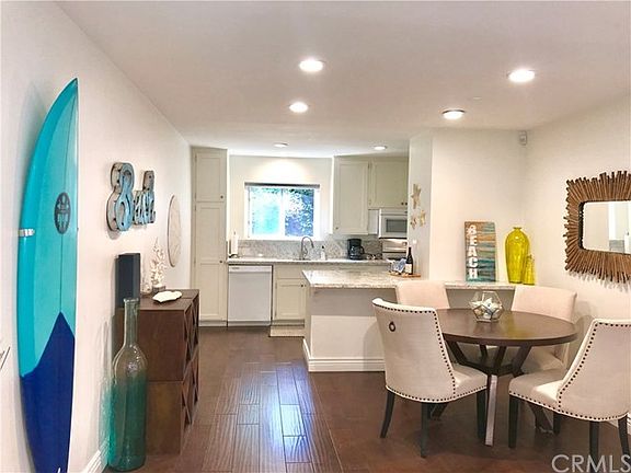 Light and bright. The can lights also have dimmers to set a relaxing mood.