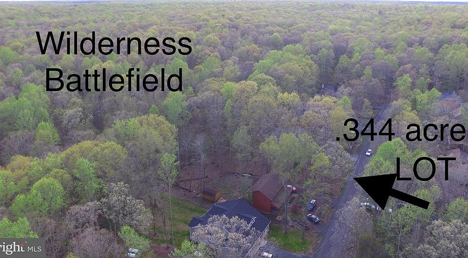 Aerial view of the rare privacy of this LOW lot