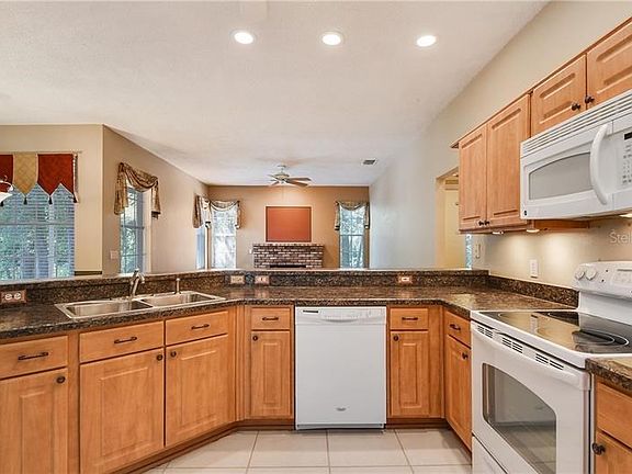 Kitchen opens to Family Room