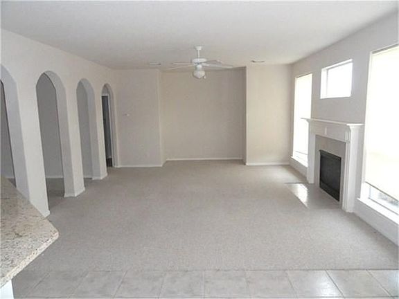 Entertainment sized living room! Be comfy-cozy by the fireplace!