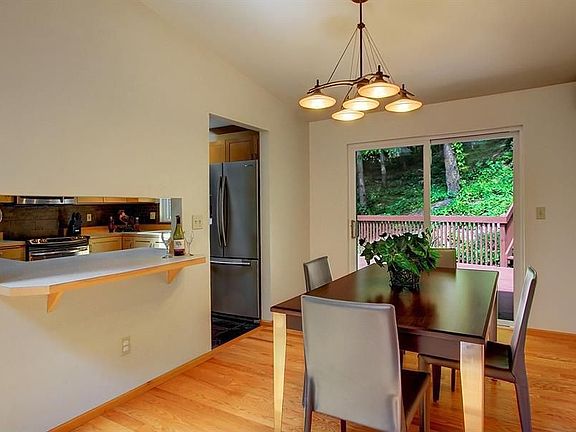 Dining area with hardwood floors